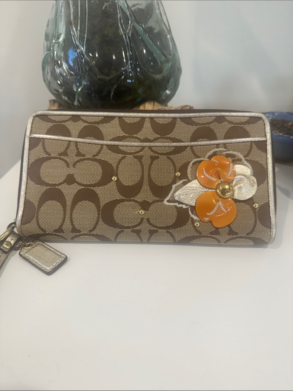 Coach Signature Canvas Wristlet with Orange Floral Applique